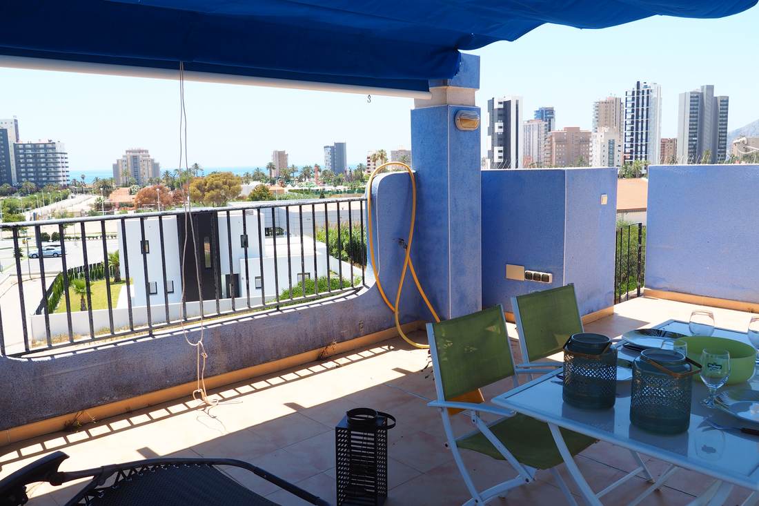 The covered terrace looking towards the tall buildings of Calpe