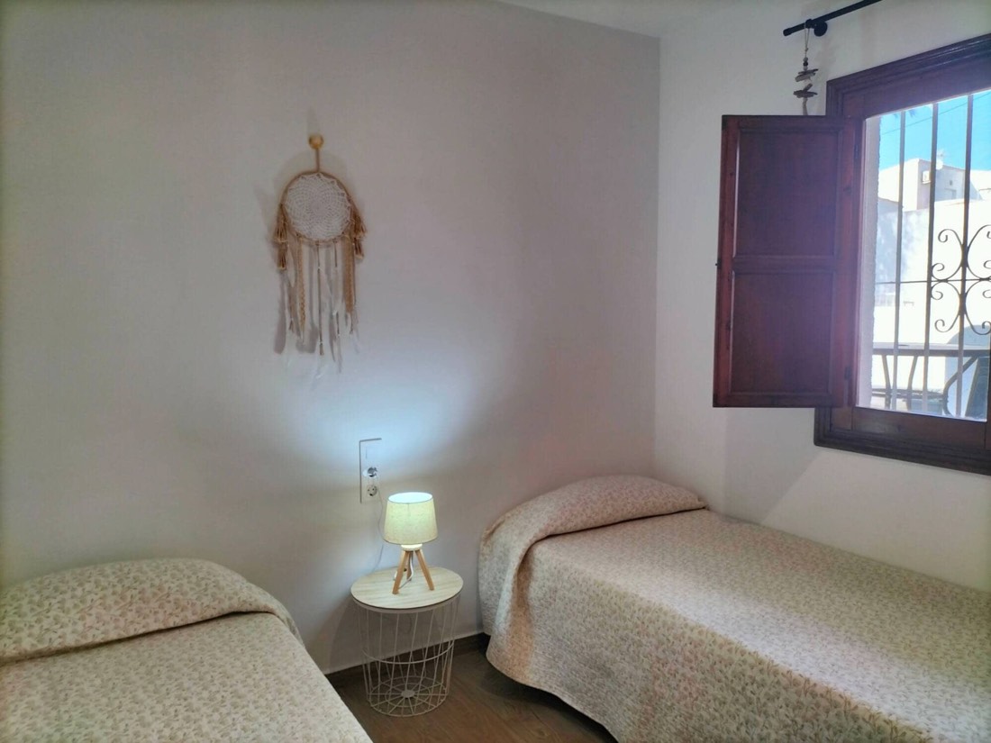 Second bedroom with two single beds