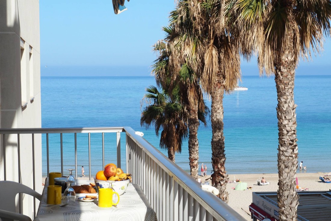 View of Levante Beach and the palm trees from the terrace
