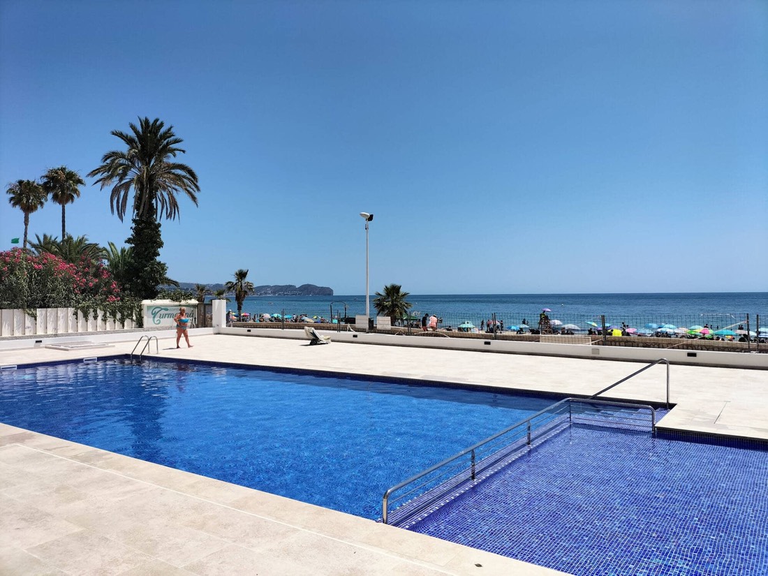 Long pool next to the beach promenade