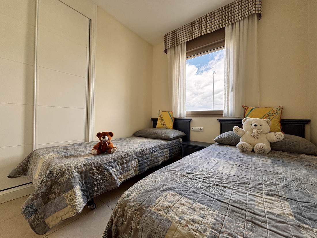 Second bedroom, with two single beds