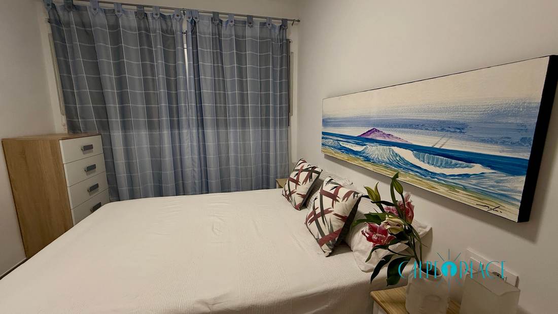 The bedroom from the door, with the chest of drawers