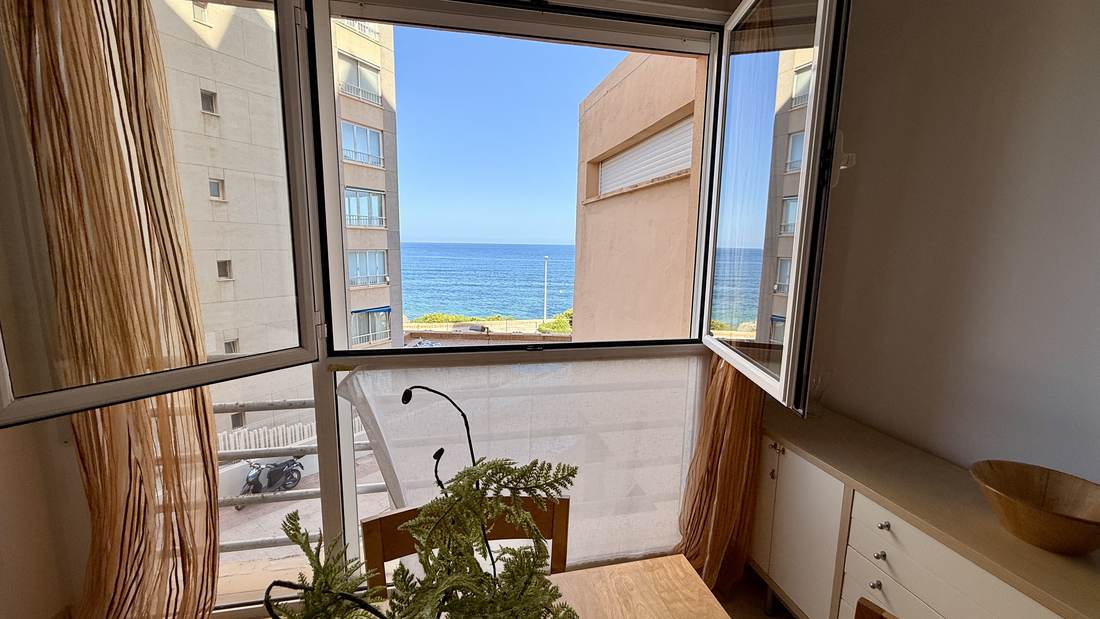 Gallery window open over the sea