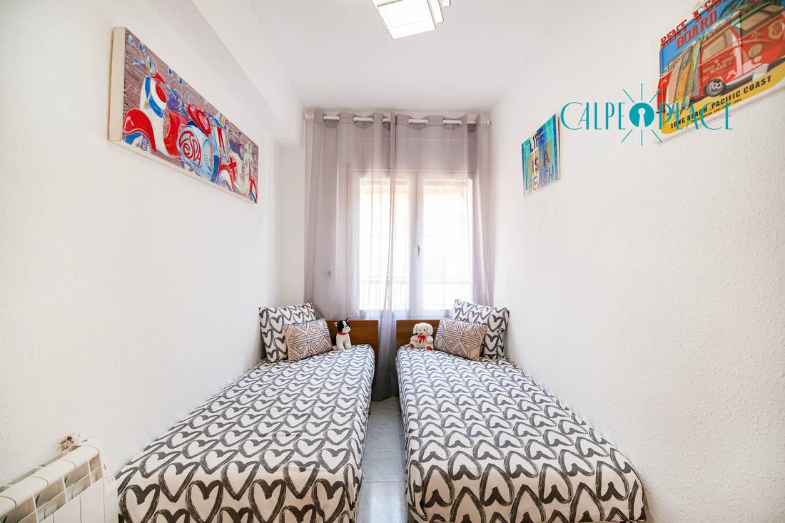 Second bedroom, with two single beds